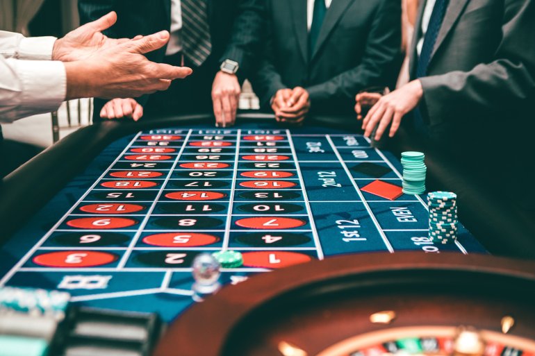gamblers at a roulette table