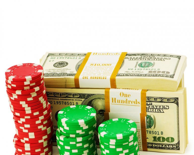 casino chips and dollar bills
