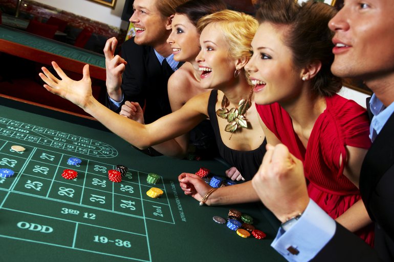 People play roulette in a casino
